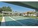 Multiple shuffleboard courts with a covered seating area at 4198 Vallarta Ct # 3027, Sarasota, FL 34233