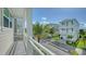 Beautiful exterior view of coastal homes with palm trees under a blue sky at 4322 Marina View Way, Cortez, FL 34215