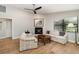 Comfortable living room features vaulted ceiling, fireplace and wood flooring at 4353 Indian Point Trl, Sarasota, FL 34238