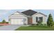 Rendering of a cozy single-story home with a garage, neutral paint, and manicured front lawn at 4425 Boxelder Avenue, Parrish, FL 34219