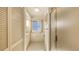 An efficiently designed bathroom featuring a standing shower, storage and vanity at 4511 Windsor Park, Sarasota, FL 34235