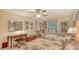 Cozy bedroom featuring two twin beds, a ceiling fan and charming decor at 4511 Windsor Park, Sarasota, FL 34235