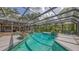 Screened pool and lanai, a perfect spot for relaxation, entertainment, and outdoor living at 4511 Windsor Park, Sarasota, FL 34235