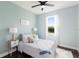 Cozy bedroom featuring a queen-size bed, soft color palette, and a window with natural light at 4617 Garden Arbor Way, Bradenton, FL 34203