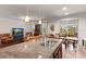 Open kitchen view with large island, connecting living and dining areas at 4617 Garden Arbor Way, Bradenton, FL 34203