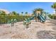 Community playground with slide, spring riders, and climbing structure offers a fun and safe space for  at 4617 Garden Arbor Way, Bradenton, FL 34203