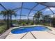 Screened pool area featuring a beautiful pool with view of the pond at 4617 Garden Arbor Way, Bradenton, FL 34203
