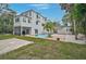 Spacious backyard featuring an inviting pool, lush landscaping, and a patio at 4831 Primrose Path, Sarasota, FL 34242