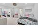 Bright bedroom with seahorse bedding, play area, and plenty of space for relaxing and playing at 4831 Primrose Path, Sarasota, FL 34242