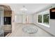Bright living room featuring hardwood floors, recessed lighting and a wooden sauna at 4831 Primrose Path, Sarasota, FL 34242