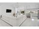 Bright living room has modern decor and an open concept to the kitchen at 4831 Primrose Path, Sarasota, FL 34242