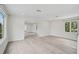 Bright, airy living room with wood floors and great natural light at 4831 Primrose Path, Sarasota, FL 34242