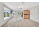 Bright living room featuring hardwood floors, recessed lighting and a wooden sauna at 4831 Primrose Path, Sarasota, FL 34242