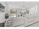 Bright living room with modern furnishings and an open layout to the kitchen at 4831 Primrose Path, Sarasota, FL 34242