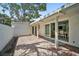 Covered patio featuring brick flooring and plenty of outdoor living space at 4831 Primrose Path, Sarasota, FL 34242