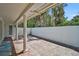 Outdoor patio includes an open-air design and brick floor at 4831 Primrose Path, Sarasota, FL 34242