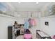 Playroom with toy kitchen, play car, dress-up clothes, and plenty of space at 4831 Primrose Path, Sarasota, FL 34242
