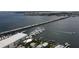 Aerial view of a bridge, marina and docks on Anna Maria Island in Holmes Beach, Florida at 4832 Independence Dr, Bradenton, FL 34210
