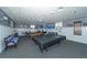 Enjoy a game of billiards in this bright and welcoming room with wainscoting, offering residents a fun and social space at 4832 Independence Dr, Bradenton, FL 34210