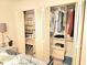 Bedroom closet featuring bi-fold doors and shelving providing ample storage for clothing and accessories at 4832 Independence Dr, Bradenton, FL 34210