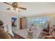 Comfortable living room with water views and an open doorway to the bedroom at 4832 Independence Dr, Bradenton, FL 34210