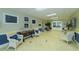 Inviting lobby area with tile flooring, comfortable seating, and nautical-themed decorations at 4832 Independence Dr, Bradenton, FL 34210
