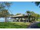 Waterfront pavilion with picnic tables and benches offering beautiful scenic views at 4832 Independence Dr, Bradenton, FL 34210
