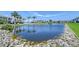 This pond at this charming condo community boasts a scenic waterfront view at 4832 Independence Dr, Bradenton, FL 34210