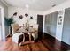 Dining area with dark wood floors and neutral color palette at 4907 Kilty E Ct, Bradenton, FL 34203