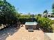 This beautiful paver patio includes a hot tub and outdoor eating area at 4907 Kilty E Ct, Bradenton, FL 34203