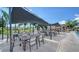 The outdoor seating area features shaded dining and lounge areas with beautiful views at 4907 Kilty E Ct, Bradenton, FL 34203