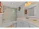 Clean bathroom featuring a shower and bathtub combination, white sink, and decor at 519 Albee Farm Rd # 212, Venice, FL 34285
