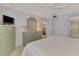 Bedroom featuring a view into the dining room and a mirrored dresser at 519 Albee Farm Rd # 212, Venice, FL 34285