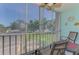 Enclosed patio with outdoor seating and a view of the outdoors at 519 Albee Farm Rd # 212, Venice, FL 34285
