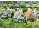 Aerial view of home with screened pool, lush backyard, and well-maintained landscaping at 5307 65Th E Ter, Ellenton, FL 34222