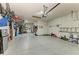 Spacious three-car garage with ample storage and epoxy flooring at 5307 65Th E Ter, Ellenton, FL 34222