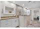 Spacious bathroom with glass shower, tile flooring, and plenty of cabinet space at 5349 Everwood Run, Sarasota, FL 34235