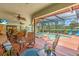 Enclosed outdoor pool and hot tub with screened in patio area and exterior entertainment space at 5349 Everwood Run, Sarasota, FL 34235