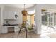 Breakfast nook with a table and chairs. The view overlooks the screened lanai at 5401 Oak Grove Ct, Sarasota, FL 34233