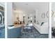 Spacious living room with stylish furnishings and seamless transition to dining area at 5401 Oak Grove Ct, Sarasota, FL 34233