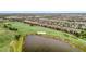 Gorgeous aerial view of the home with golf course views and ponds at 5528 Palmer Cir # 104, Bradenton, FL 34211