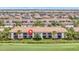 Beautiful aerial view of the condo building with golf course views at 5528 Palmer Cir # 104, Bradenton, FL 34211