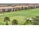 A manicured golf course surrounding a luxury community at 5528 Palmer Cir # 104, Bradenton, FL 34211