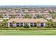 Beautiful aerial view of the condo building with golf course views at 5528 Palmer Cir # 104, Bradenton, FL 34211
