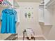 Well-organized walk-in closet with ample shelving and hanging space to maximize storage in a clean and functional layout at 5528 Palmer Cir # 104, Bradenton, FL 34211