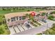 Beautiful condos feature tile roofs, multiple garages, and meticulously manicured lawns, creating an inviting neighborhood at 5528 Palmer Cir # 104, Bradenton, FL 34211