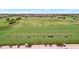 Expansive golf course and driving range with lush green fairways and putting greens in a beautiful community setting at 5528 Palmer Cir # 104, Bradenton, FL 34211