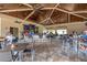 Spacious restaurant area with a bar, seating and TV screens for entertainment at 5528 Palmer Cir # 104, Bradenton, FL 34211