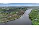 Aerial view displaying the river and marshy areas near the property at 5935 River Forest Cir, Bradenton, FL 34203