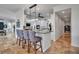 Kitchen area featuring a kitchen island with seating and modern appliances at 5935 River Forest Cir, Bradenton, FL 34203